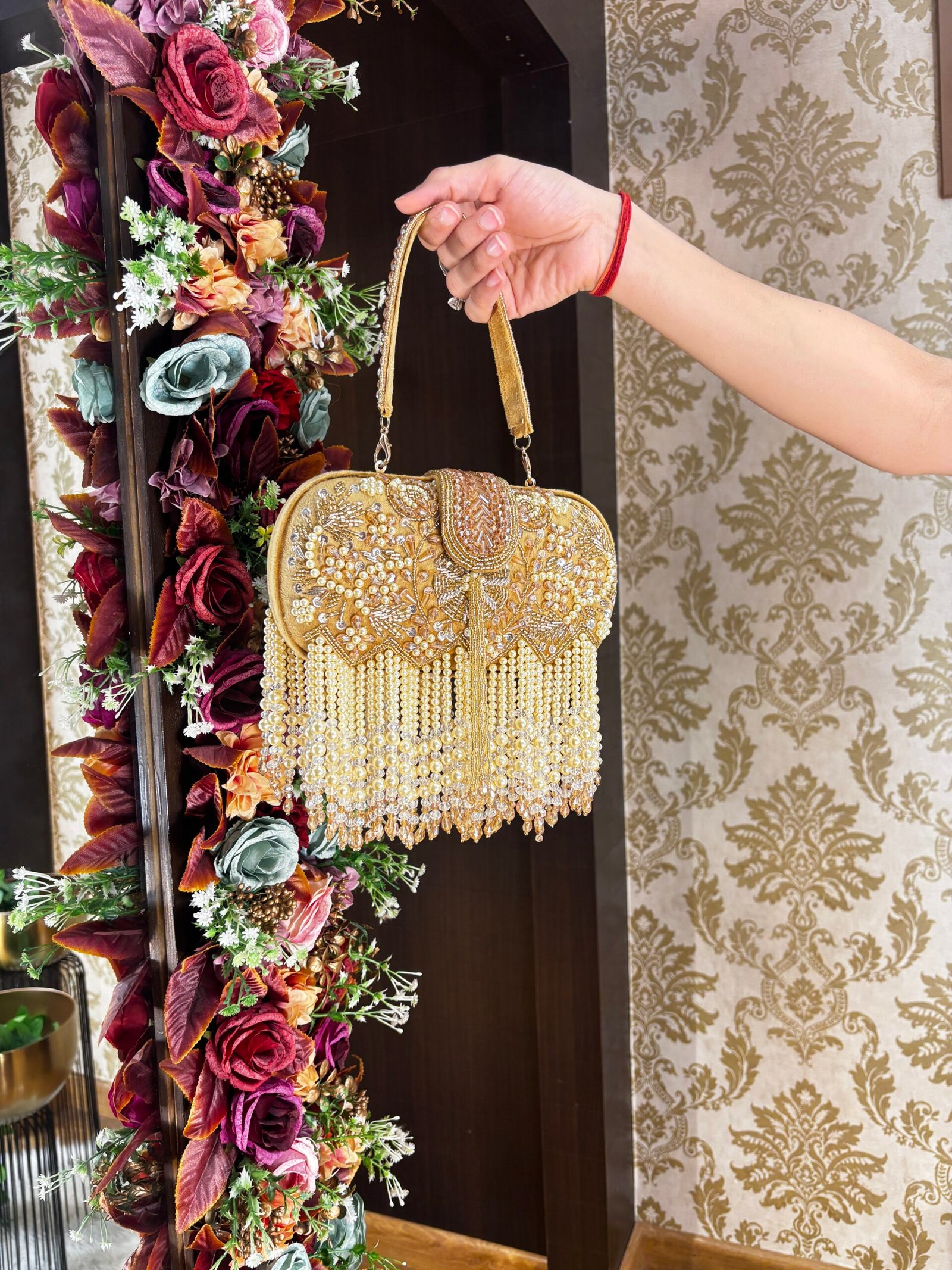 GOLD HEAVY PEARL CAPSULE BAG