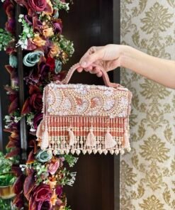 ROSE GOLD DRAMATIC TASSEL BAG